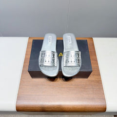 ALAIA FLAT SANDALS WITH PERFORATED STRAPS 25S IN SILVER LAMBSKIN