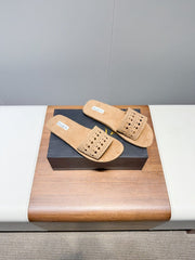 ALAIA FLAT SANDALS WITH PERFORATED STRAPS 25S IN BEIGE SUEDE