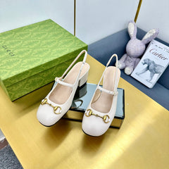 HORSEBIT PUMP IN WHITE SHEEPSKIN