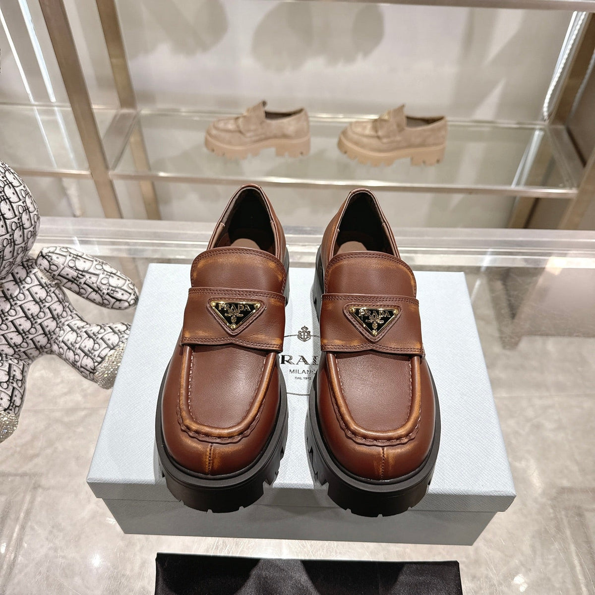 PRADA 25S THICK-SOLE LOAFERS 60 MM IN BROWN SMOOTH CALFSKIN