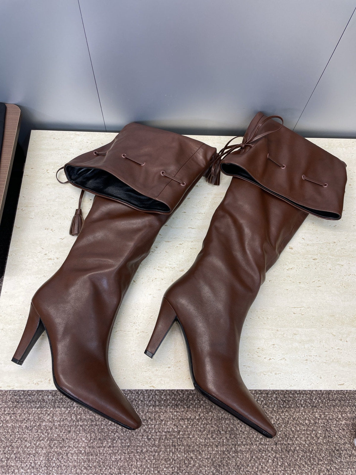 YSL 25S HIGH‑HEEL FRINGED MARTIN BOOTS 90 MM IN DARK BROWN LAMBSKIN