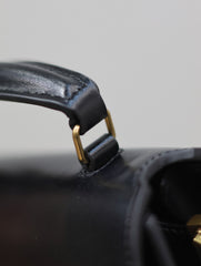 CASSANDRA MINI TOP HANDLE BAG 20 IN BLACK SMOOTH LAMBSKIN GOLD HARDWARE