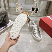 PUFFY LEATHER LOW TOP SNEAKERS IN SILVER PATENT LAMBSKIN