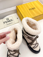 FENDI BOOTS 50MM IN BLACK AND BEIGE SHEARLING AND SUEDE