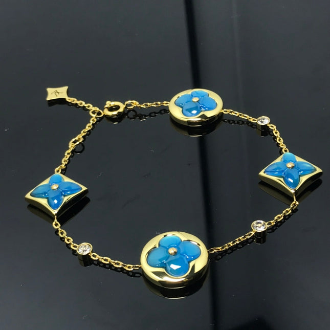 STAR AND SUN 4 MOTIF BLUE BRACELET