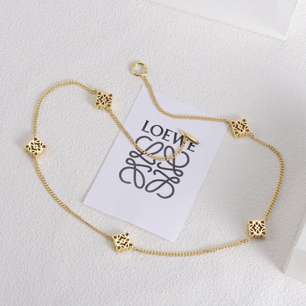 ANAGRAM 5 MOTIFS GOLD NECKLACE